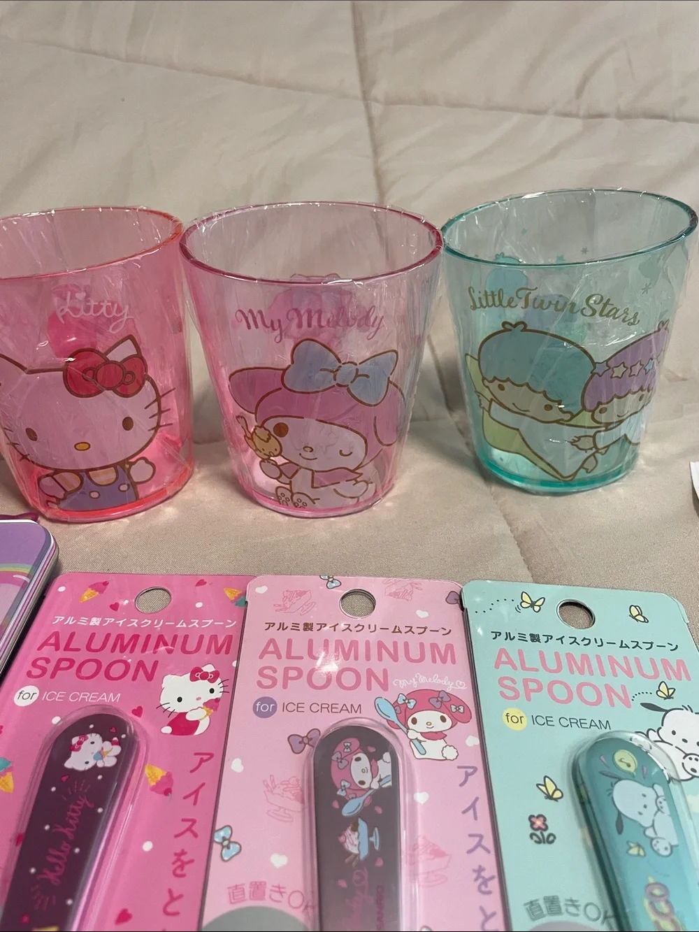 Sanrio Bundle: includes cups, utensils, notebook and zippered pouch.